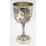 An Antique 19th Century Large Solid Silver Goblet. Ornate floral decoration throughout. 19.5cm tall.