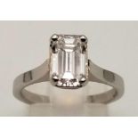 A wonderful platinum solitaire ring with an emerald cut diamond (1.37 carats), of exceptional