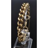 A Vintage 9K Yellow Gold Flat Curb-Link Bracelet. 18cm. Lobster clasp with safety chain. 57.38g.