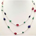 18 grams ruby, emerald and blue sapphire long chain necklace in 925 silver. 82cm.