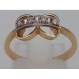 18K YELLOW GOLD DIAMOND SET BOW RING 2.3G SIZE M