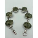 SILVER BRACELET set with Siberian SÉRAPHINITE . Comprising six gemstones individually mounted in