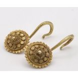 An Ancient Greek Possibly Roman Pair of 22K Gold Wheel Earrings. Both with a swan-hook drop.