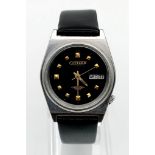 Citizen eagle automatic 21 jewel watch black tone face with leather strap. 38mm. Length: 23cm.