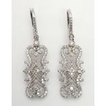 A Pair of 18K White Gold and Diamond Art Deco Style Drop Earrings. Beautiful filigree and piercing