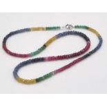 A Natural Emerald, Sapphire and Ruby Bead Necklace. 40cm