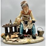 A Vintage and Rare Capodimonte Cortese Shoe Cobbler Figurine. 26 x 24cm. As new.