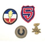 Four USA GI Badges.