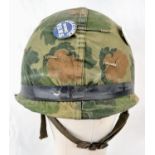Vietnam War Era US M1 Helmet and liner. Complete with a reversible Mitchel/Duck Hunter cover.