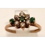 A Vintage 9K Yellow Gold Emerald and White Stone Ring. Size J 1/2. 1.6g total weight.