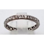 A PLATINUM AND DIAMOND FULL ETERNITY RING. 2.7gms size Q