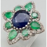 9.80cts Blue Sapphire Ring with 3.40cts Emeralds and 1.5cts Diamonds. Size M 1/2. 10.82 grams.