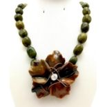 A Vintage Natural Nephrite Jade Necklace. Beads with a large floral centre-piece. 42cm. 110g total