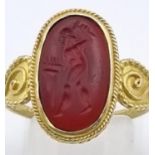 An Ancient Greek Possibly Roman 22K Gold Intaglio Carnelian Agate Ring. Size O. 3.81g total weight.