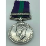 Genuine George VI MALAYA MEDAL with clasp and ribbon awarded to DVR L.G.WOOD RASC for service during