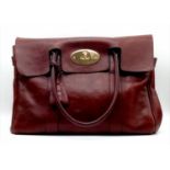 A MULBERRY BAYSWATER bag in oxblood red colour. appr. dimensions: 37 x 16 x 27 cm. ref: 9346