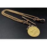 A 22K Gold 1913 Full Sovereign Coin with a 9K Gold Fob Chain. 25.92g total weight.