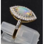 Fire Opal gemstone ring 14kt solid gold, .33cents diamonds and opal .75cents. Comes with GLI