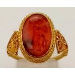 An Ancient Greek Possibly Roman 22K Gold Intaglio Carnelian Agate Ring. Size P. 4g total weight.