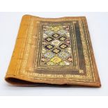 Antique leather Islamic book cover decorated with 22ct yellow gold and marked. Size: 23cm x 15cm