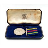 Civil defence long service medal in royal mint case of issue. Un-named as issued. EF