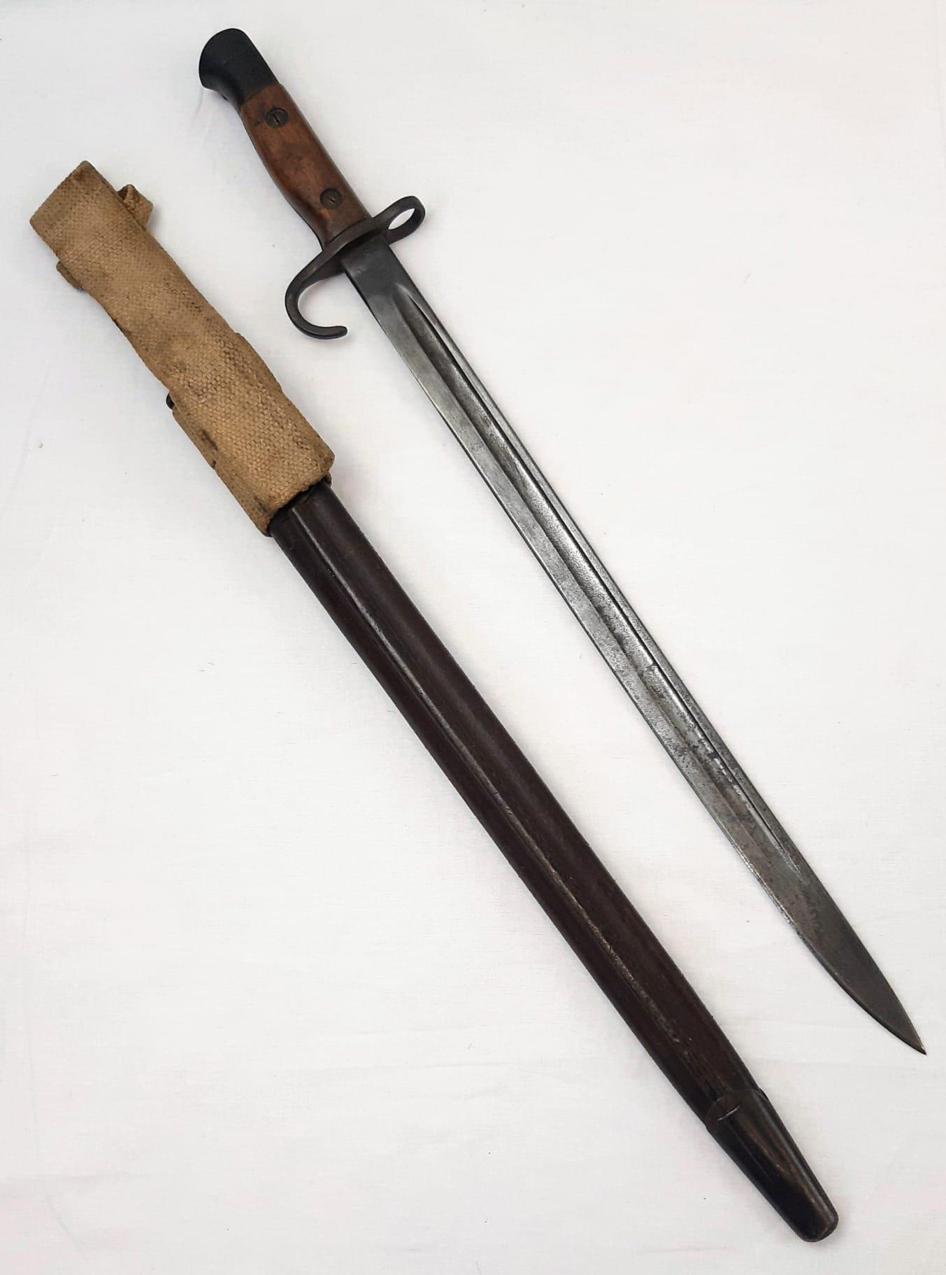 1907 Hooked Quillion Bayonet. Maker Enfield. Complete with early tear drop scabbard and frog. - Image 2 of 5