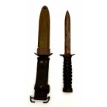 WWII US M3 Fighting Knife with US M8A1 Scabbard by T.W.B. Manufactured at the top of the pommel is