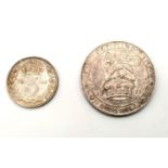 A Silver George V 1911 One Shilling and a Queen Victoria 1893 Threepence coin. Please see photos for