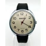 Rakuta Russian Automatic stainless steel watch with leather strap. 38mm. Length: 23cm.