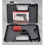 A Blank Firing Glock Pistol by Aksa Arms. 9mm calibre. No - 21-00272 cased. Please note