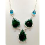 A Malachite and Topaz Teardrop Necklace. Set in white metal. 40cm.