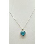 A Topaz Heart Pendant set in 925 Silver on a 925 Silver Disappearing Necklace. 1 and 42cm.