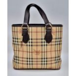 A BURBERRY handbag. App. dimensions: 30 x 11 x 28 cm. Ref: 9347