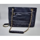 A vintage blue leather CHANEL handbag. Appr. dimensions: 28 x 8 x 22 cm. REF: 9334