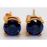 A Pair of Lab-Created Sapphire Earrings set in 925 Gilded Silver.