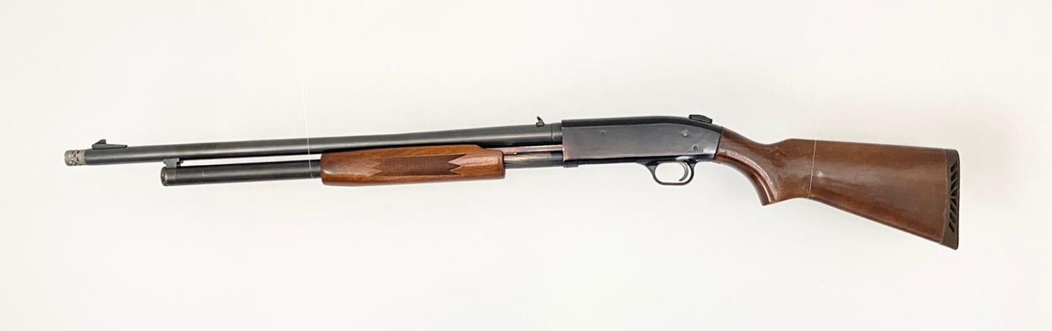 A Mossberg Model 500ATP 12 Gauge Pump Action Shotgun. Extended safety. Good clean barrel. 4 x