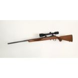 A Ruger M77/22 Bolt Action .22 Rifle. Very good, near mint condition overall. Fitted Bushnell
