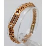 A Sophisticated 9K Yellow Gold Bar and Curb Link Bracelet. Decorated with bright white stones. 16.