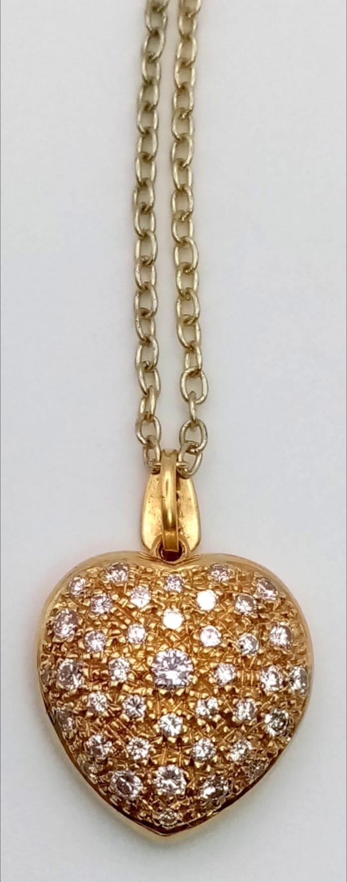 An 18K Yellow Gold Heart-Shaped Diamond Pendant. With over 1ct of bright white diamonds this - Image 2 of 4