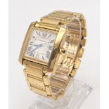An 18K Solid Gold Cartier Tank Francaise Gents Watch. 18K Gold Case - 35 x 28mm. Automatic movement.