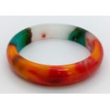 A Wonderful Multi-Coloured Jade Bangle. Inner diameter 6.5cm.