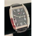 Gentlemans Quartz TOMMY HILFIGER wristwatch,Square black face model finished in silver tone with