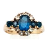 A 9K Yellow Gold Blue and White Stone Dress Ring. Size M. 3.1g total weight.