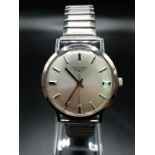 A Classic 1970s Longines Gents Watch. Fitted with a speidel expandable stainless steel strap for