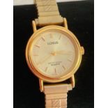Ladies LORUS Quartz wristwatch in gold tone. Full working order. Expandable gold tone bracelet.