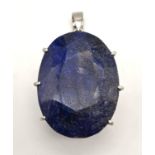A sterling silver pendant with a huge oval cut blue sapphire. Dimensions: 54 x 38 x 24 mm, weight: