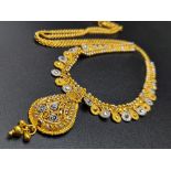 A Glamourous 22k Yellow and White Gold Asian Design Necklace with Hanging Shell Pendant. 3 and 40cm.