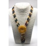 A Butter-Yellow Aventurine, Agate and Carnelian Statement Necklace. Multi-coloured agate cylinders