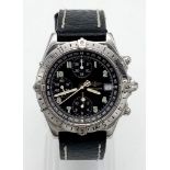 A Breitling Chronomat GMT Automatic Gents Watch. Black leather strap. Stainless steel case - 40mm.