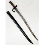 An Antique 1870s Mauser Rifle Bayonet and Scabbard. 69cm total length.